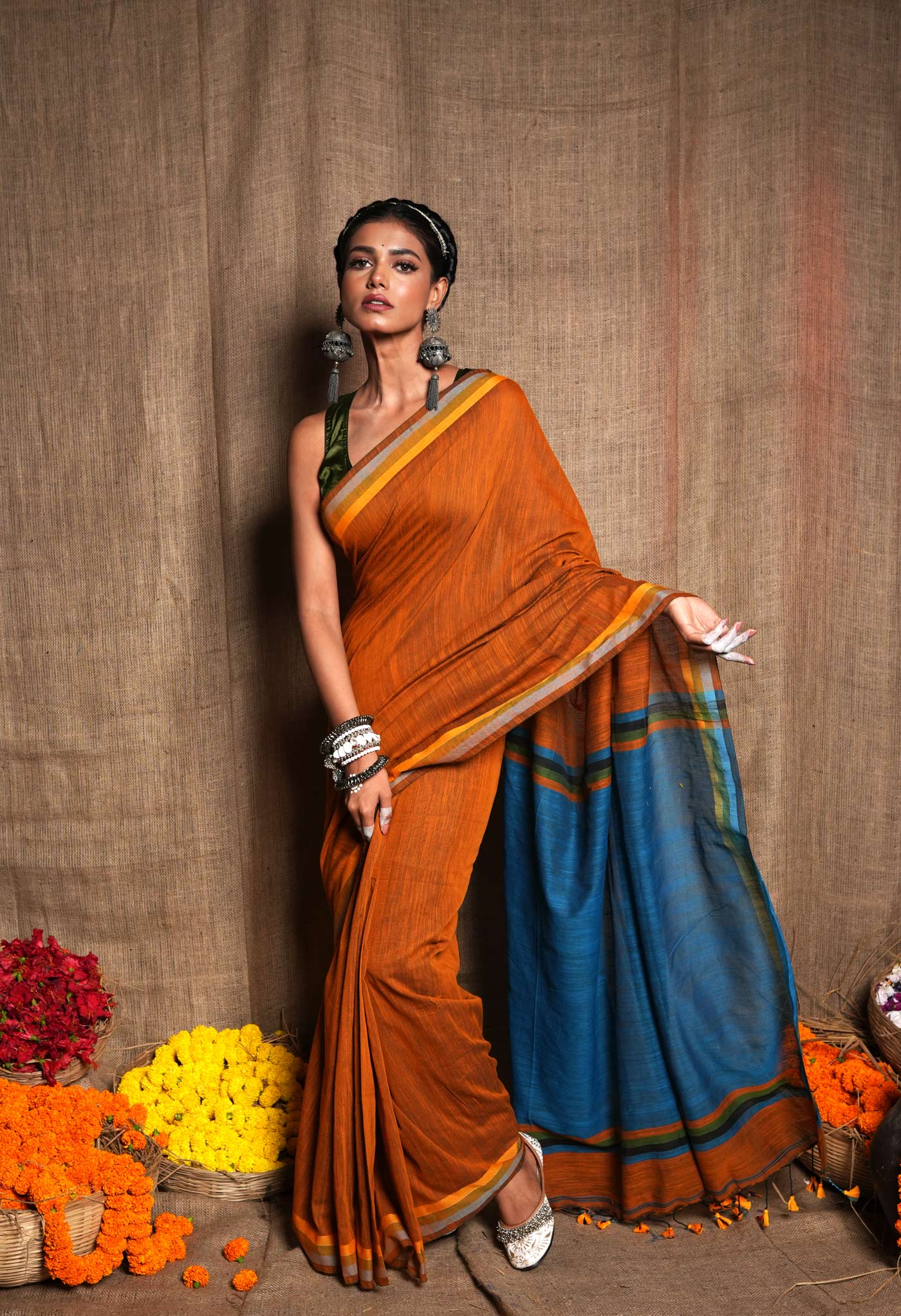 Tvis and Bliss. Orange Copper Mix and Royal Blue Pochampally Ikkat Silk  Saree